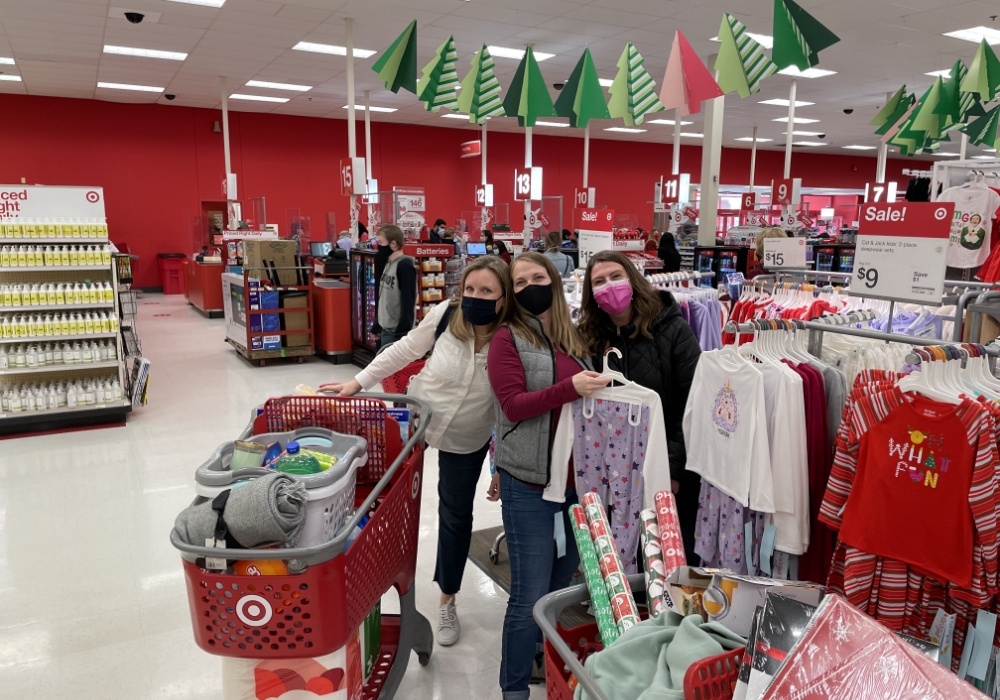 Dental team members buying clothes for children at Target