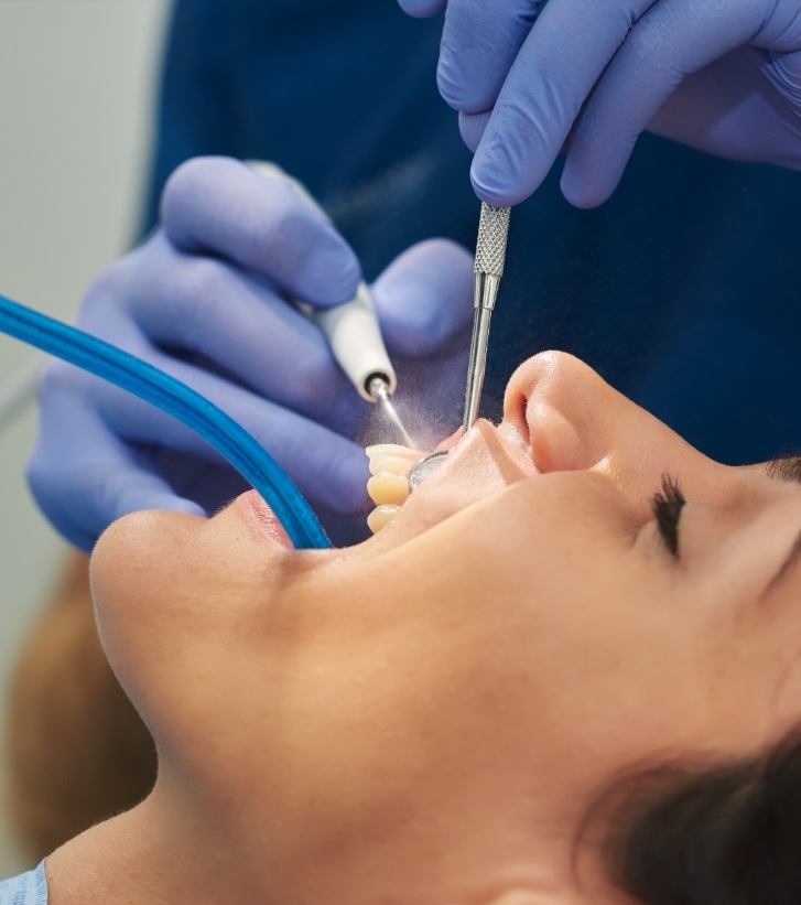 Dental patient receiving gum disease treatment