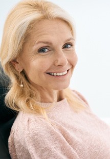 patient smiling in dental chair