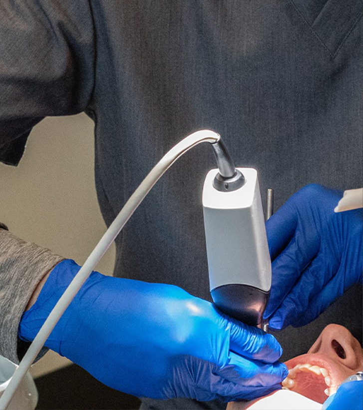 Doctor Wahlen treating a dental patient