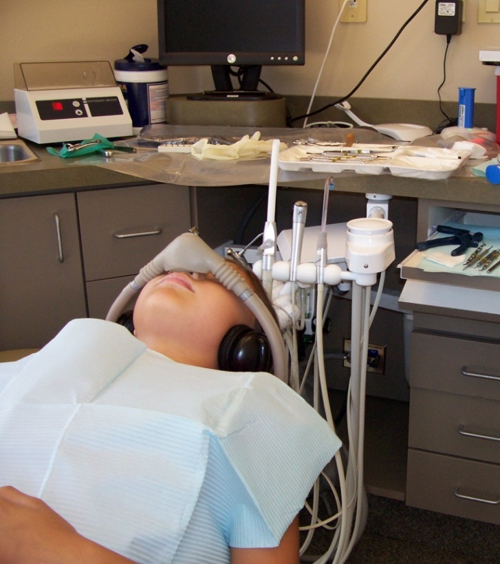 Dental patient with nitrous oxide sedation mask on