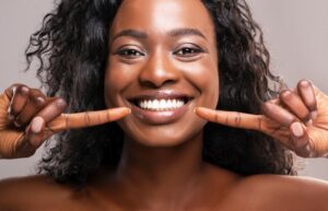 Woman with veneers smiling with veneers