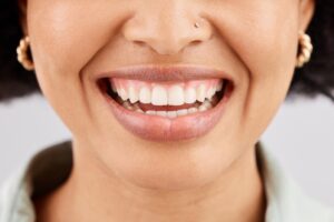 Woman with straight teeth smiling